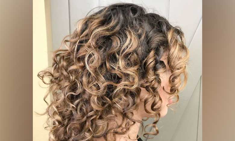 Mid-Length Curls women's hairstyles for curly hair
